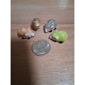 Vintage Miniature, hand-painted ceramic hedgehog figurines.